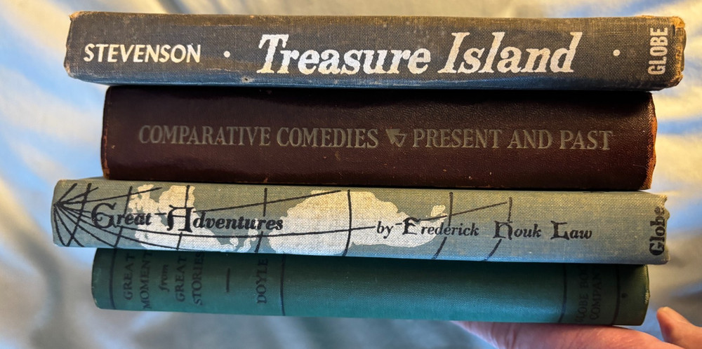 4 school edition movie tie-ins VG Treasure Island-Man without a Country-Holiday