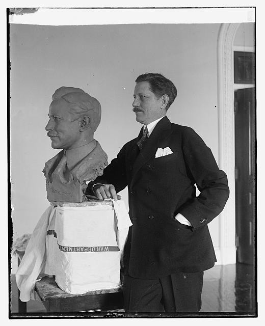 Secretary War of by Patrick poses for sculptor. Secretary bust War J. noted