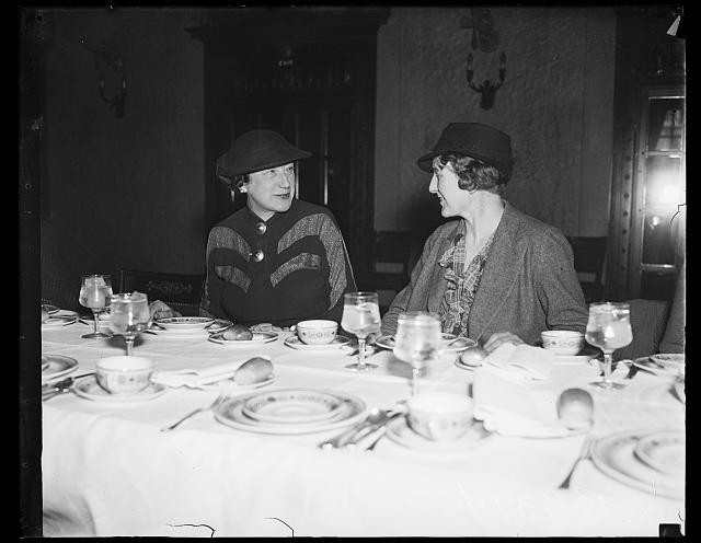Photo:1936 Women at Formal Dinner Table Hats Glassware Portrait