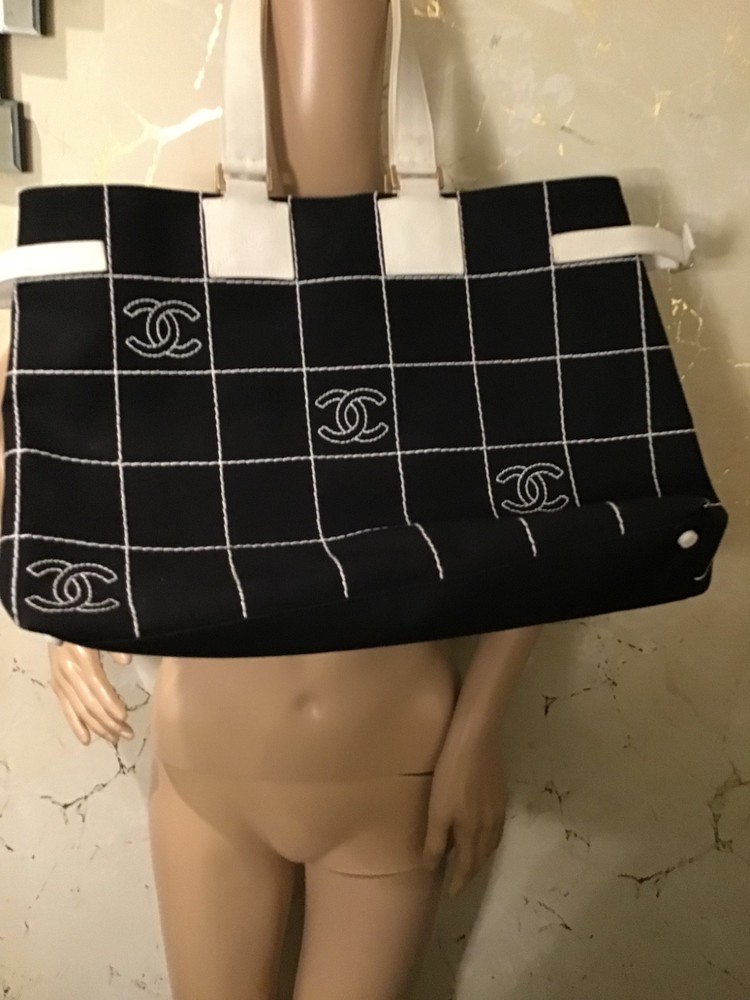 $6,975  Chanel  Classic Black  & White  Handbag /Bag/Tote  New. Reduced $900.