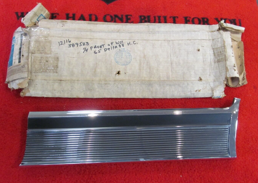 1965 Oldsmobile Delta 88 NOS GM Left Rear Lower Quarter Chrome Molding 389523