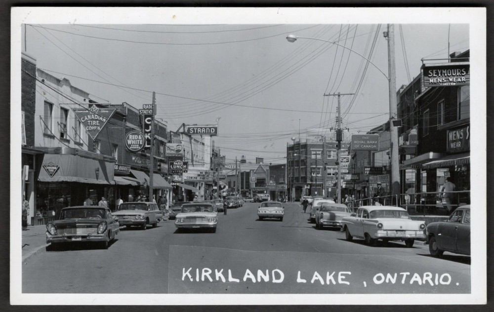 Canada KIRKLAND LAKE Ontario 1950s Street View Stores Cars. Real Photo Postcard
