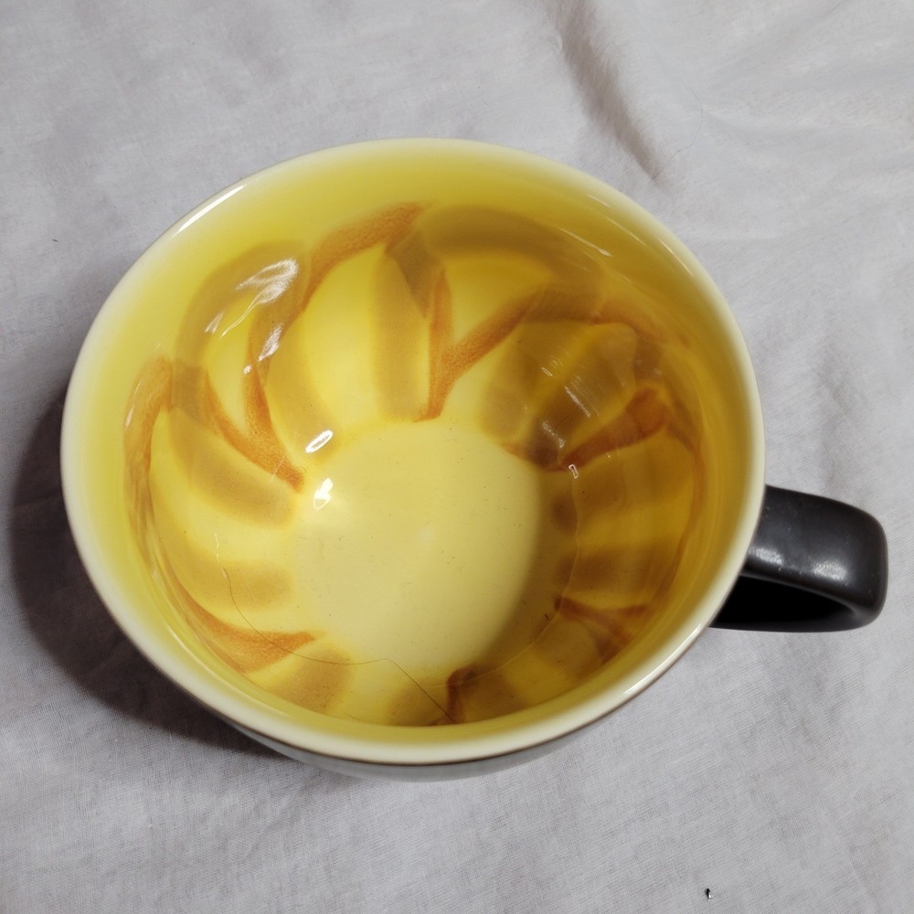 Starbucks 2012 Sunflower Coffee Mug Matte Black Yellow Swirl Interior 16oz