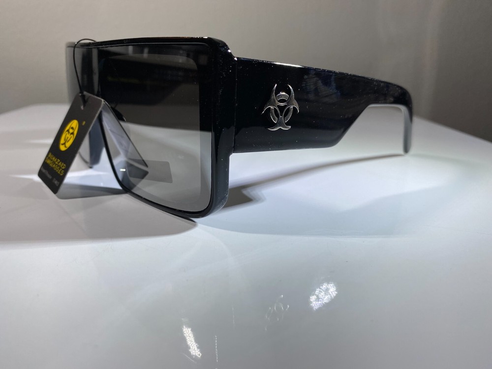 Futuristic Unisex Black Frame Sunglasses with Gray Reflective Lenses for Men and Women