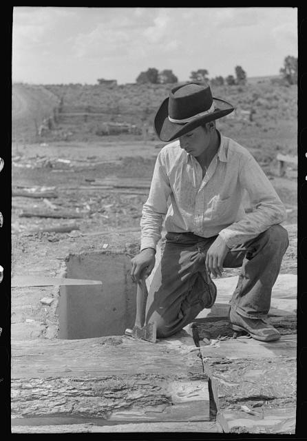 Photo:Amalia New Mexico 1940 Spanish-American Boy Building Roof House