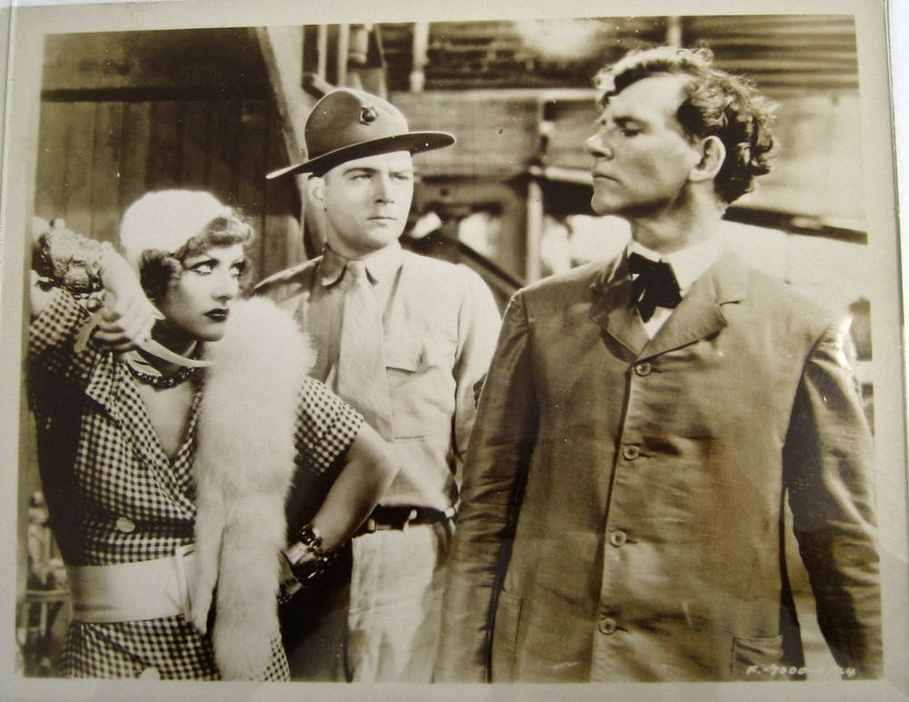 Joan Crawford, Wm. Gargan, W. Huston in the film 