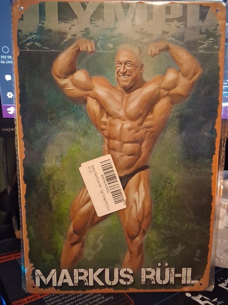 Markus Ruhl German Body Builder Tin Metal Wall Sign Fan Decor 12x8In Man Cave
