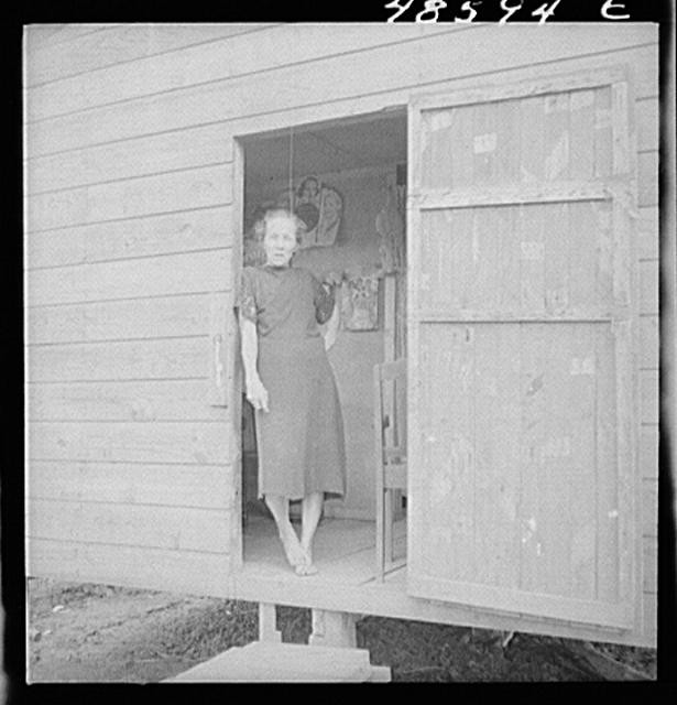 Photo:San Juan Puerto Rico 1930s Slum Area Woman Standing at Doorway FSA