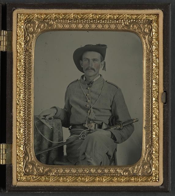 Unidentified soldier in Maryland Confederate cavalry uniform with sword and