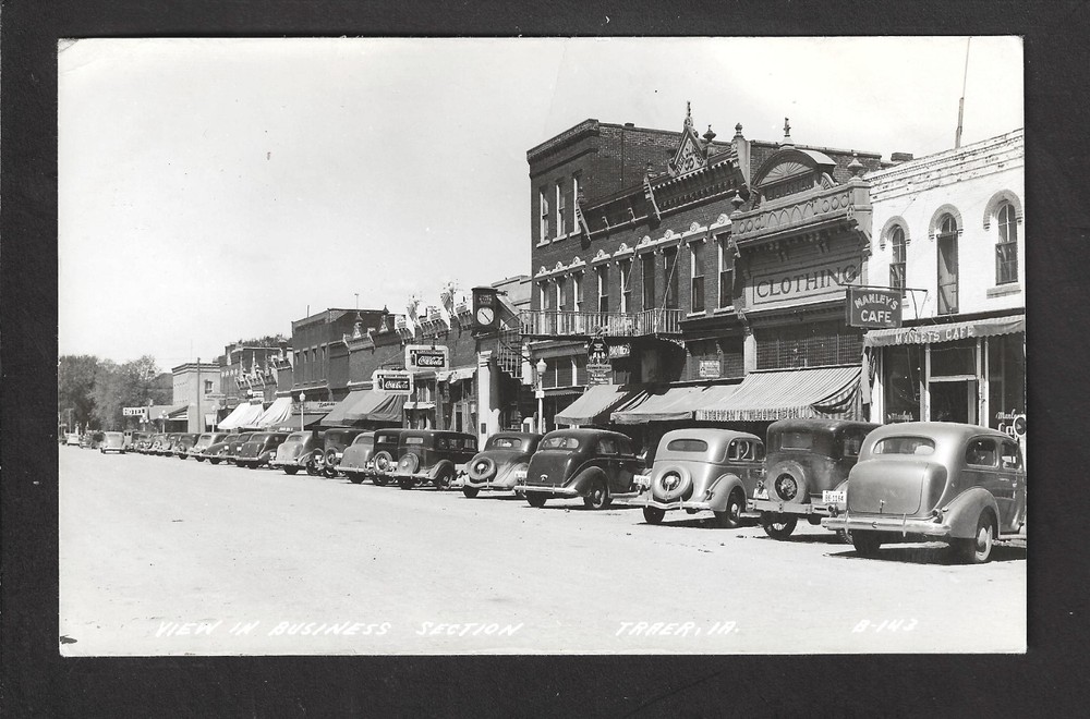Traer Iowa IA 1930s RPPC Main St Manley's Cafe, Cigar Store, Bank Clock, HOTEL +