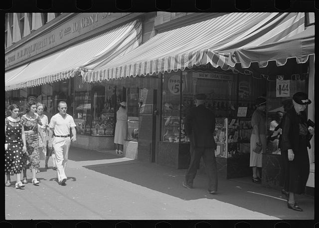 Photo:Manchester New Hampshire 1937 street scene pedestrians storefronts