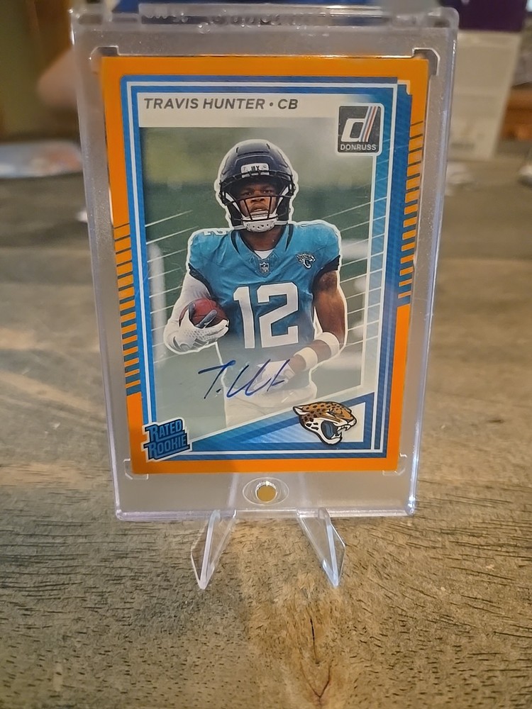 2025 Panini Donruss - Rated Rookie Travis Hunter #301 Orange Autographs (AU, RC)