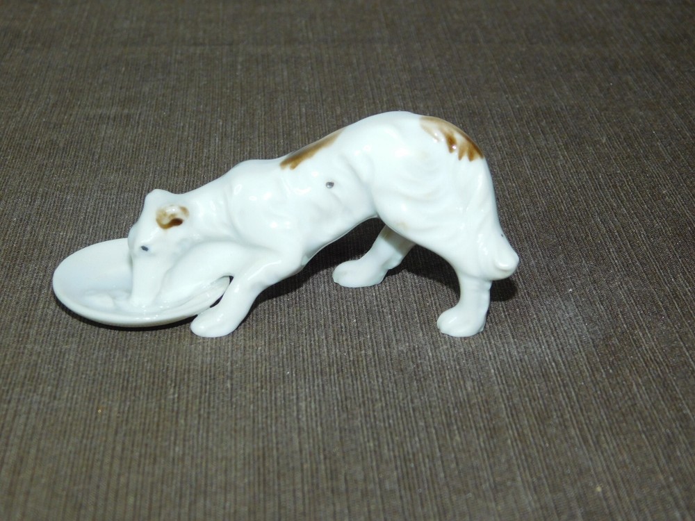 Vintage 4-Inch Ceramic Porcelain Dog Eating Figurine Collectible