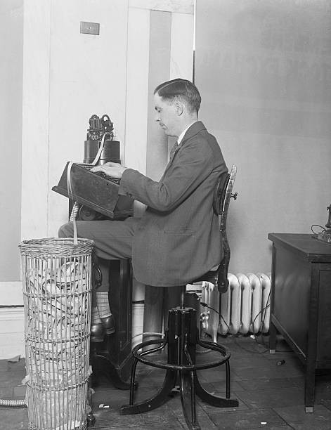 New York Man working a stock exchange ticker 1924 Old Historic Photo