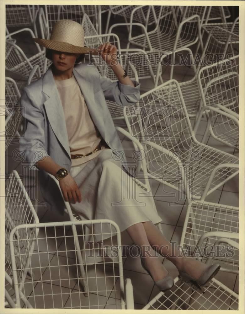 1984 Press Photo Women's Spring Fashion Dress Model Sitting in Chairs