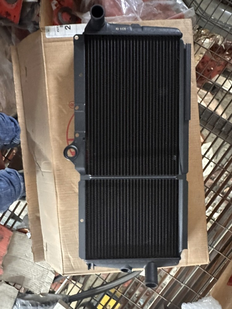 Engine cooling radiator Alfa Romeo 33 new and original 60504386