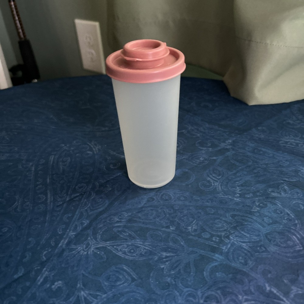 Tupperware #1329-3 Salt or pepper Shaker Clear with Rose Color Round Shaker Lid