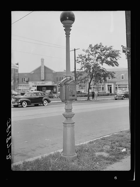Photo:United States 1940s Civilian Defense Air Raid Alarm Box Street Scene