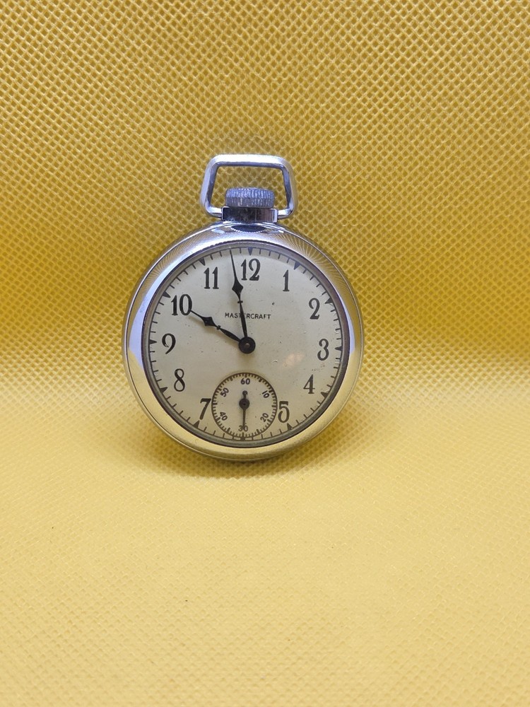 Vintage Antique Mastercraft Pocket Watch with Intricate Design  