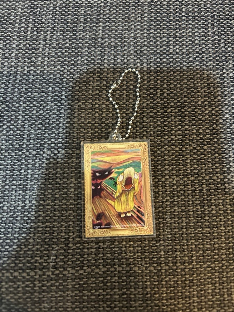 Pokemon Munch the Scream Psyduck Acrylic Keychain Charm Rare