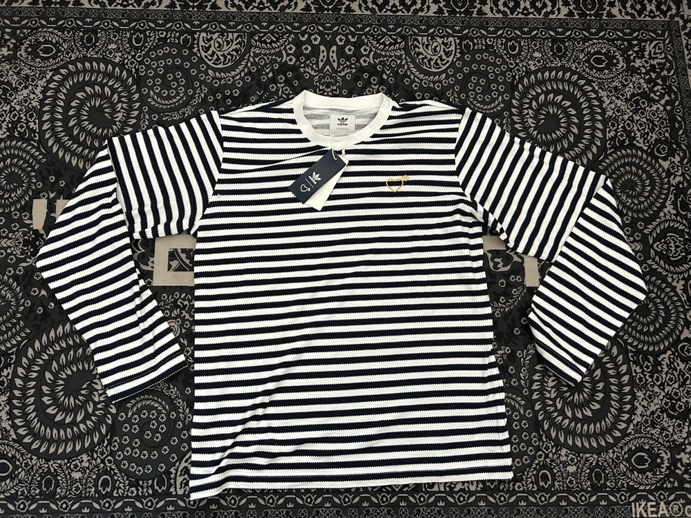 This is an Adidas x Human Made long sleeve tee in collegiate navy and white M
