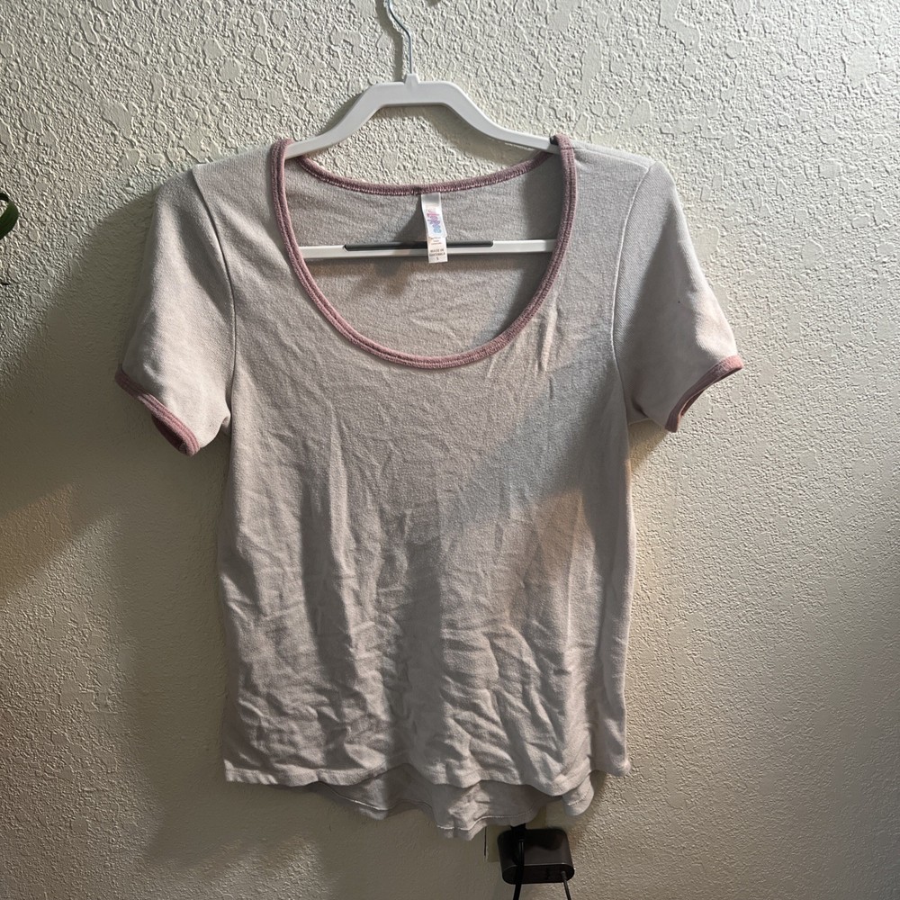 LuLaRoe Classic T short-sleeve shirt in a cream color with pink ringer trim