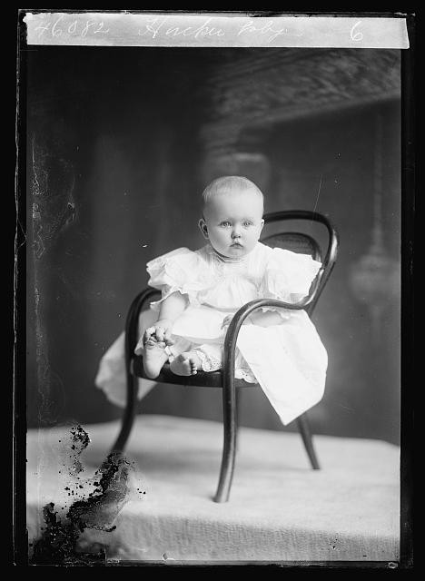 Photo:Hacker Baby Portrait Infant in White Dress on Chair 1894-1901