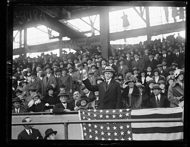 Photo:President Coolidge in stands with baseball