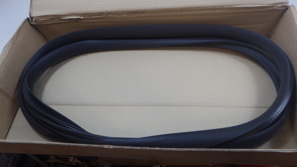 Tesla Model Y door seal left rear on body genuine new 1497675