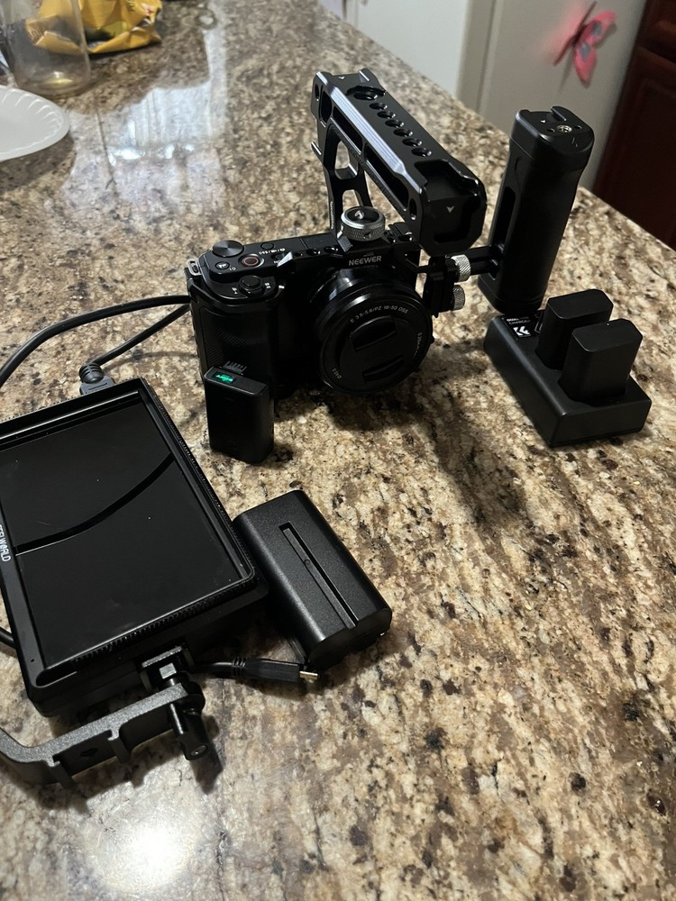 Sony Alpha ZV-E10 Mirrorless Digital Camera with 16-50mm Lens and Batteries