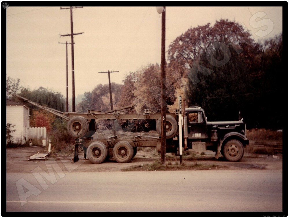 Mack Trucks New Metal Sign: 1956 J. Diani - Piggy Backed Log Hauler Trailer?