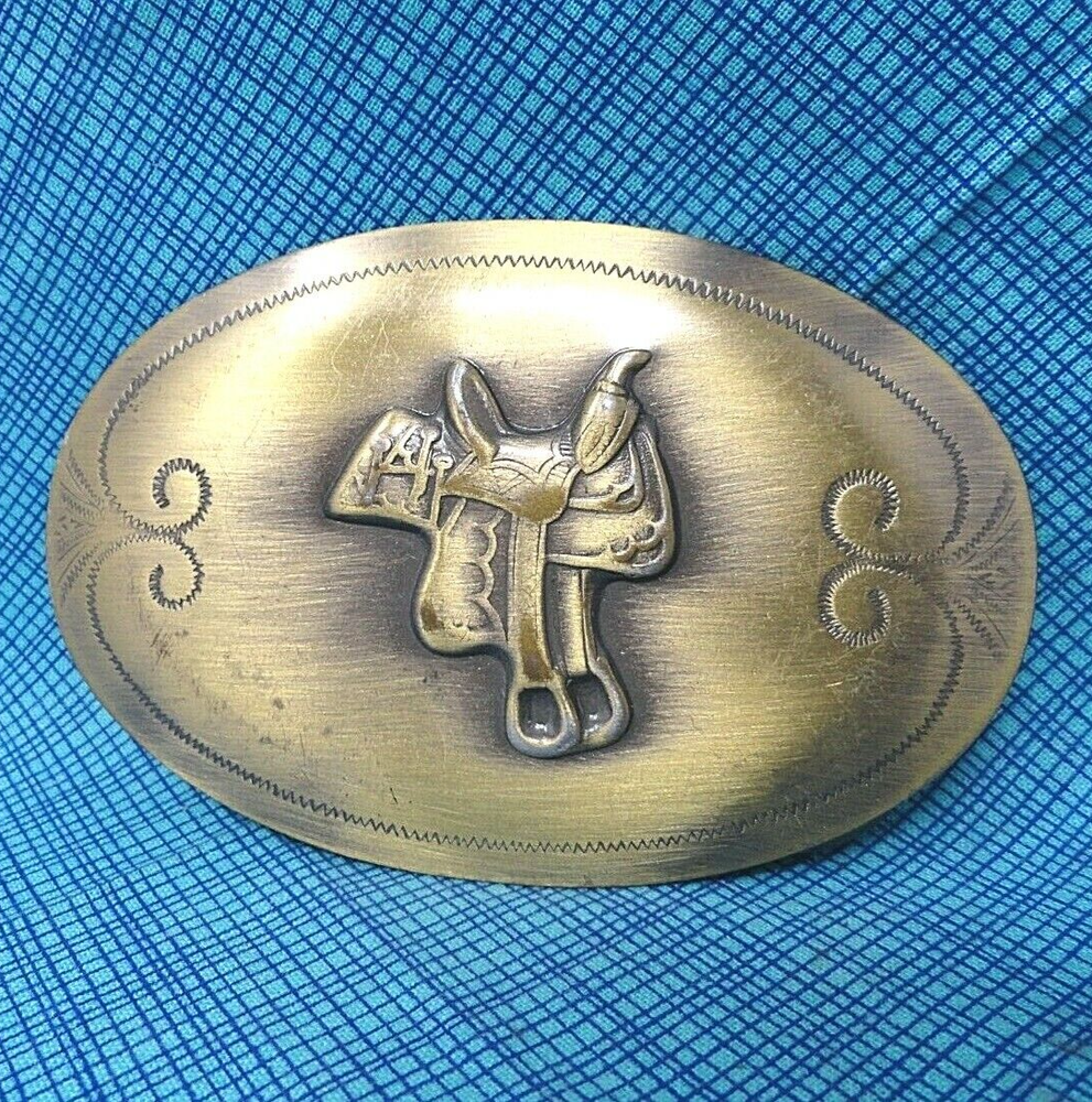 Western Saddle Belt Buckle Brushed Gold Tone Cowboy Cowgirl Vintage 80s  .TWY137