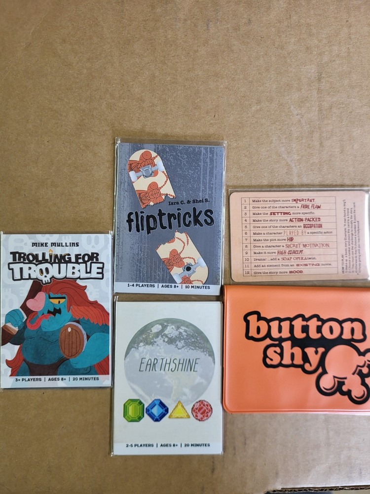 Button Shy Micro Games And Orange Wallet- Trolling For Trouble Starter And More