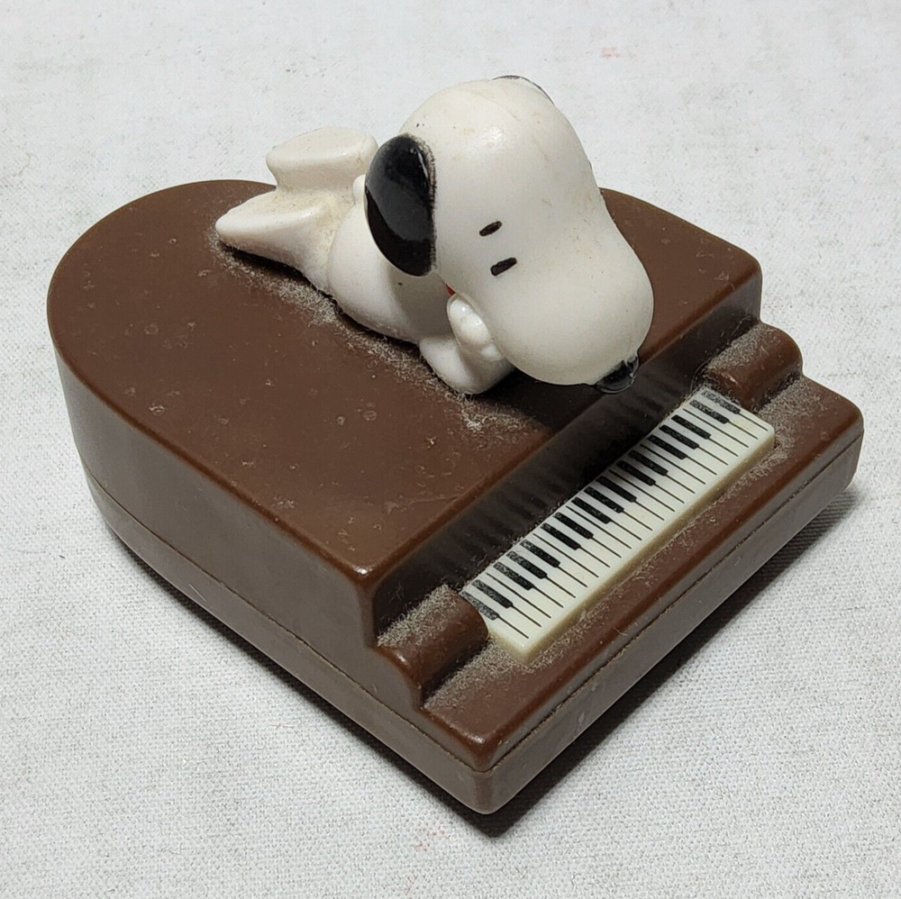 2007 Burger King Snoopy Laying on Piano Battery-Powered Collectible Toy