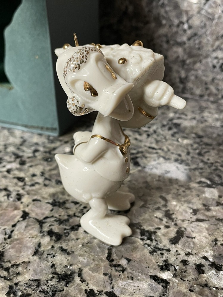 Lenox Disney Donald Duck Christmas Ornament with Gold Accents Carrying Tree-image