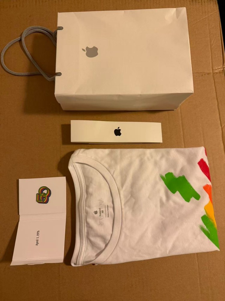 Apple 50th anniversary memorabilia- medium tshirt, 50th anniversary pin.