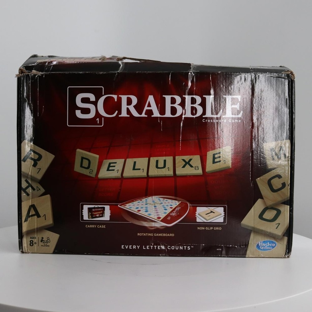 Hasbro Gaming Scrabble Deluxe Edition Letter Tiles Word Game | Rotating Board