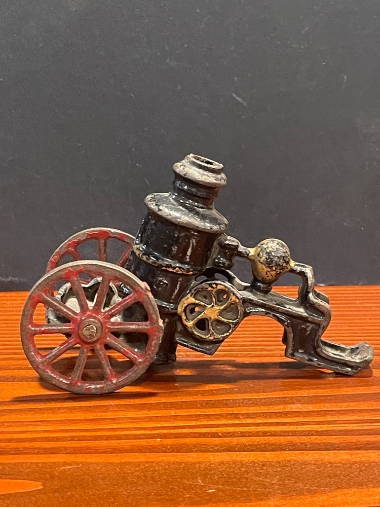 antique cast iron fire pump wagon