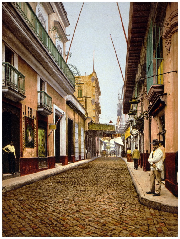 4883.Man in white coat waits on empty cuban street.POSTER.Decoration.Wall Art