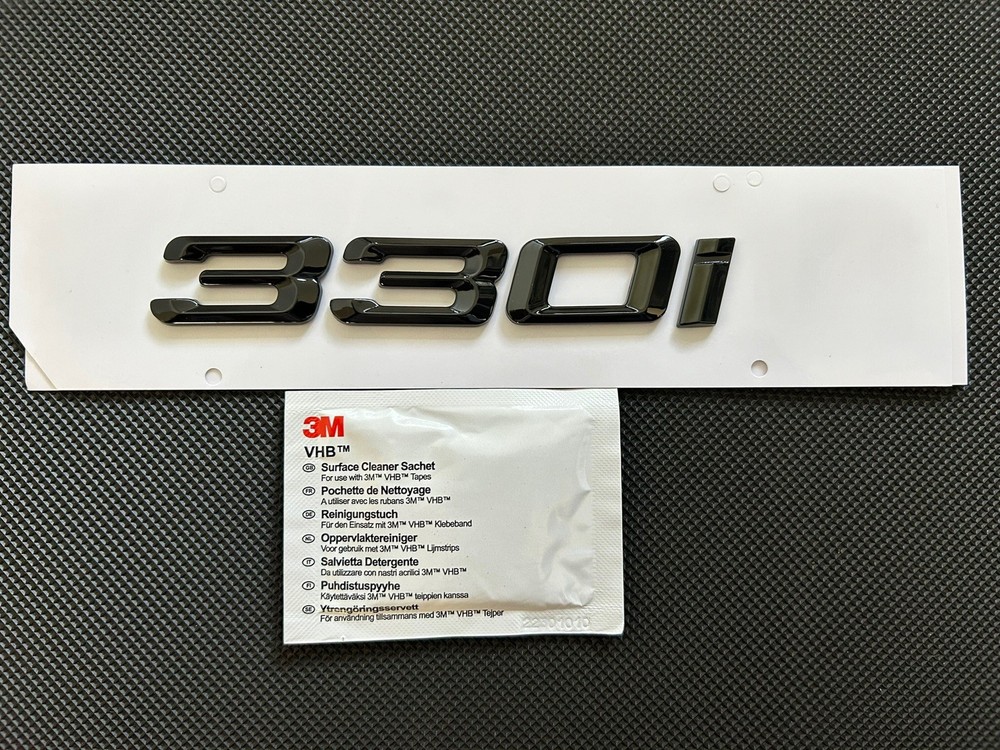BMW 330i  BADGE IN GLOSS BLACK. FREE ALCOHOL WIPE