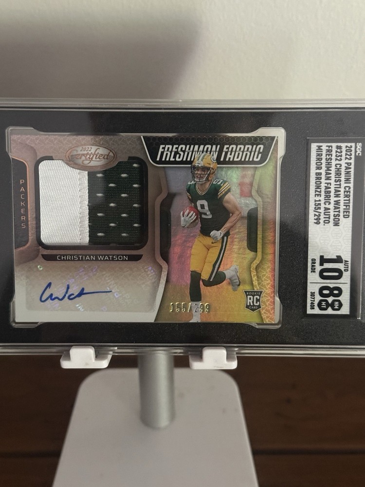 2022 Panini Certified - Freshman Fabric Mirror Signatures Christian Watson #232 Mirror Bronze /299 (AU, MEM, RC)