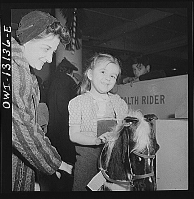 Photo:New York NY 1930s Macy's Toy Department Hobby Horse Rides Children