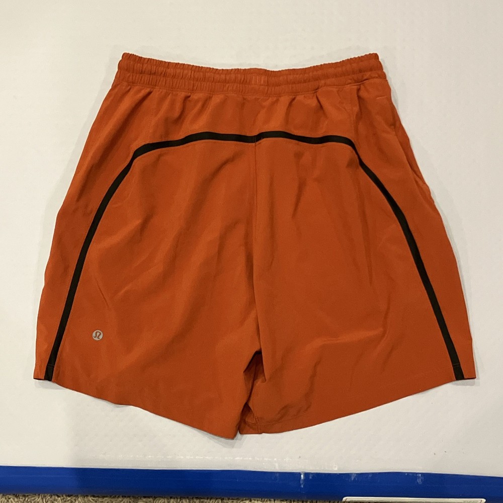 lululemon Men's Medium Pace Breaker Linerless Shorts 7”  LM7AA6S Rust Orange