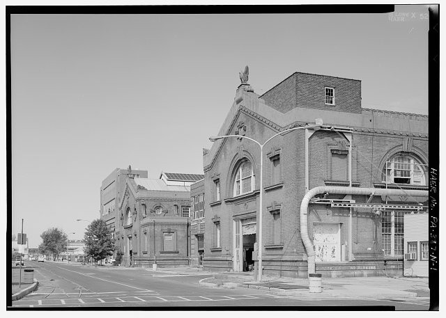 View northwest of building 19 area used for pattern shop storage (foreground),