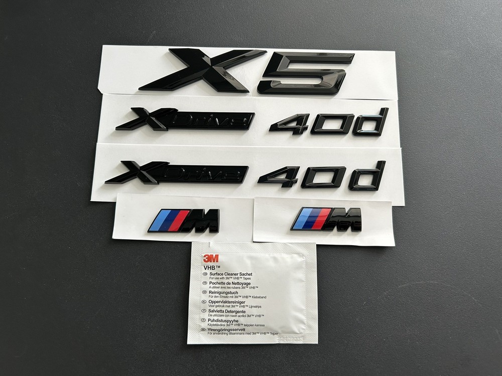 BMW X5 + 2X Xdrive 40d + 2X M WING BADGES IN GLOSS BLACK. FREE ALCOHOL WIPE