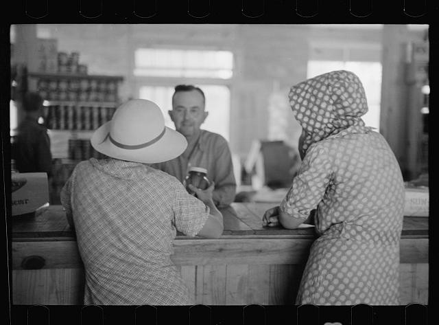 Photo:1930s Women in Hats at Counter Interior Portrait
