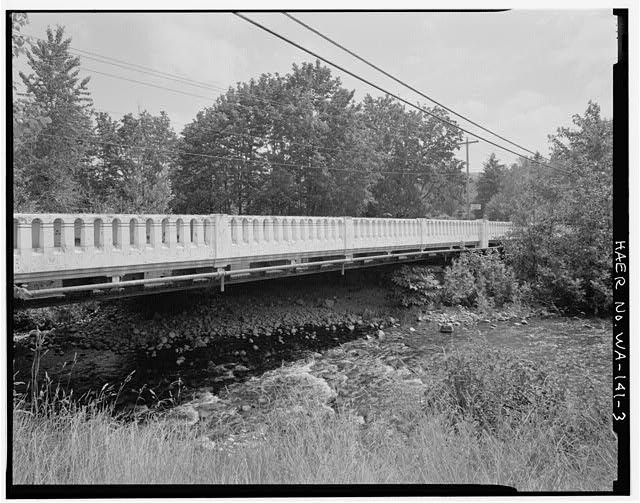 3. West side bridge, looking southeast from bank, shows white concrete sidewalk