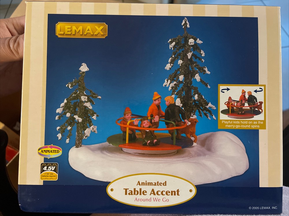 LEMAX Retired 2005 Animated Christmas Village Table Accent Around We Go-image