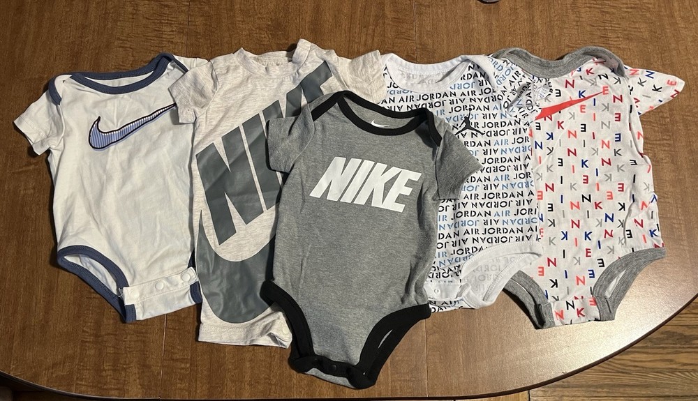 Nike and Jordan Official Baby One-piece Bodysuits Lot of 5 Sizes 3 to 9 Months