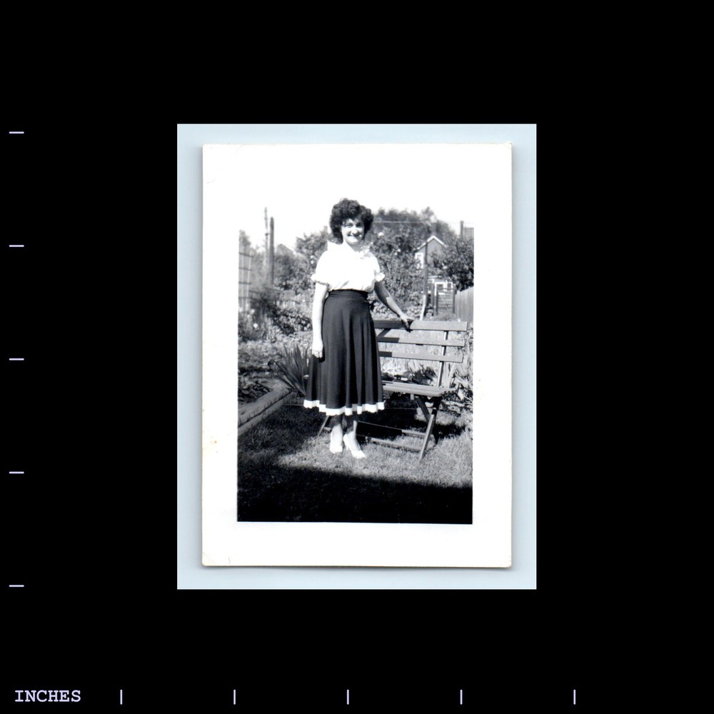 Old Vintage Photo WOMAN STANDING BY BENCH IN YARD